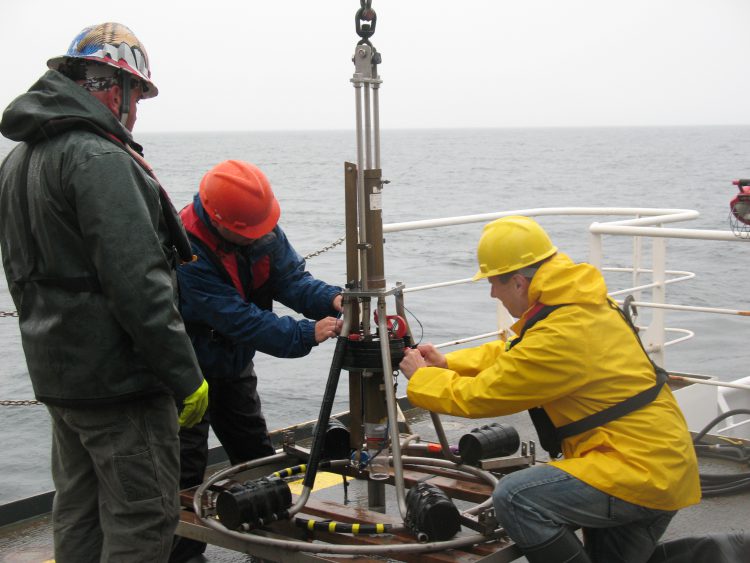 Preparing a Craib Corer for deployment in the Gulf of Maine. (Credit NOAA National Centers for Coastal Ocean Science)