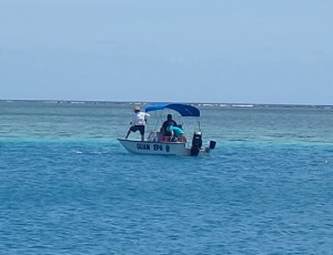 Sampling of sediments from one of the Guam EPA boats