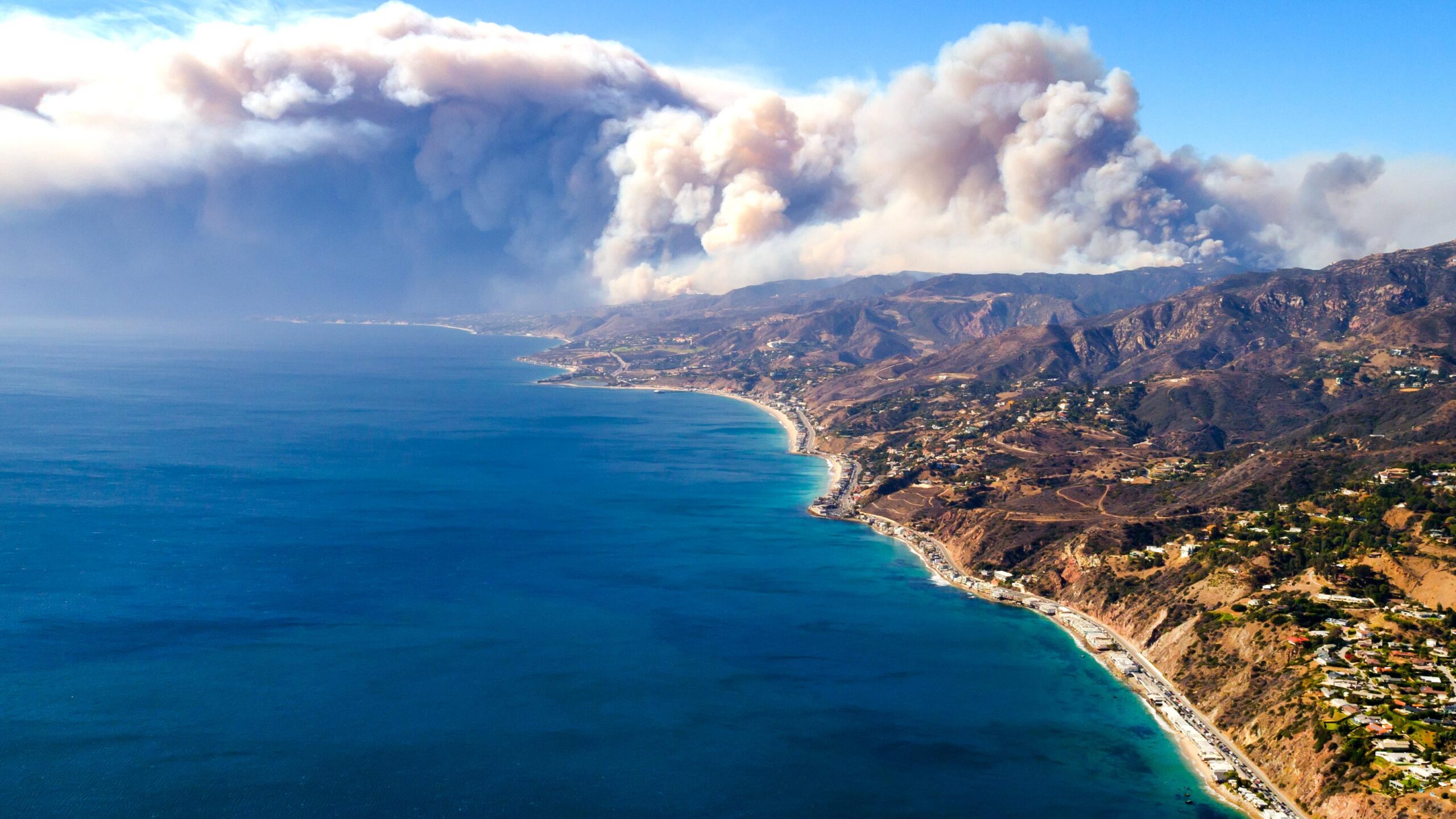 Woolsey Fire smoke plume rises above California coast near Malibu, November 2018.