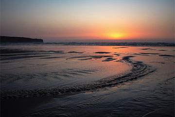 Sunset over sandy flat