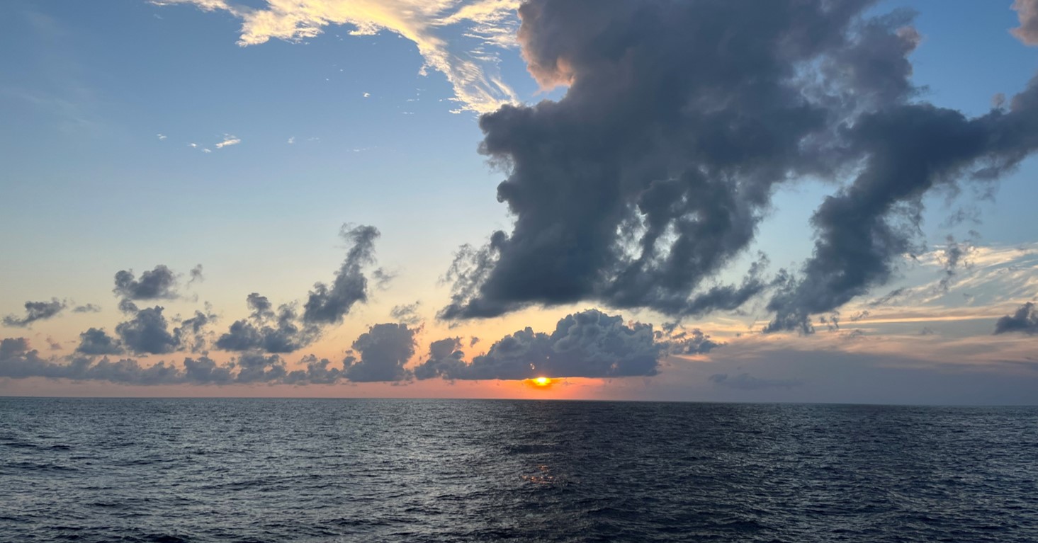 View over ocean looking towards the sunrise