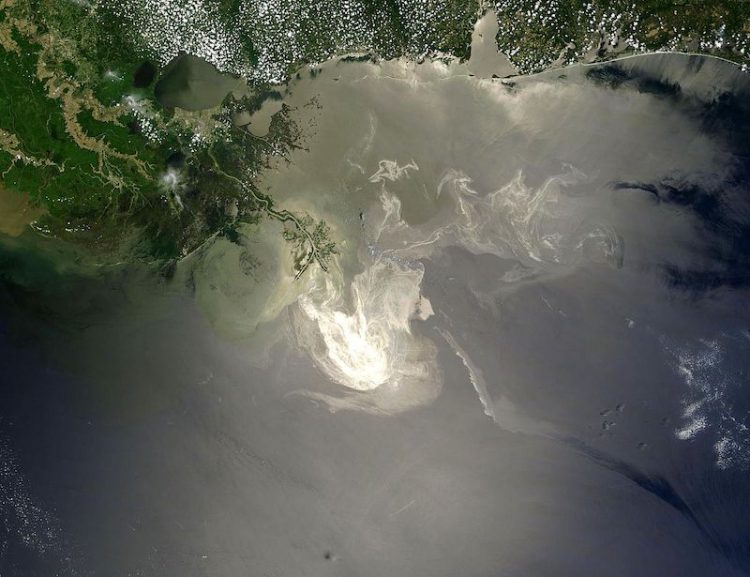 Sunlight illuminates a lingering oil slick off the Mississippi Delta after the Deepwater Horizon oil spill